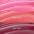ColourPop So Juicy Plumping Gloss Balm with Peptides swatches showing She’s So Juicy shades: Dolled Up (bright pink), Guava Glaze (coral peach), and Berry Spritz (deep berry), displayed as glossy curved stripes in a close-up bundle layout.
