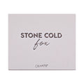 Stone Cold Fox shadow palette shown closed, featuring embossed βSTONE COLD foxβ lettering on a pale taupe faux-leather cover with ColourPop logo, studio-lit on a white background; a sleek neutral ColourPop Shadow Palette packaging shot.