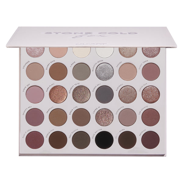 Stone Cold Fox ColourPop Shadow Palette displays 30 coolβtoned neutrals - taupes, mauves, grays, and charcoals - in matte and shimmer finishes, arranged in rows inside a white rectangular case with a soft pink lid and printed shade names.