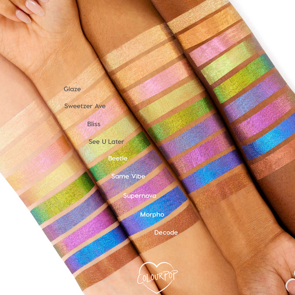 ColourPop Vibe Shift Chrome Liquid Shadow swatched on multiple arms, showcasing multichrome metallic stripes that shift pink, green, gold, blue, and purple across varied skin tones on a white background.