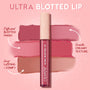 ColourPop Ultra Blotted Lip in Espresso Martini stands centered, slim tube with beige cap, while mauve and nude swatches behind it show a diffused blotted finish, smooth creamy texture, and long-lasting, comfy wear on a pink gradient backdrop.