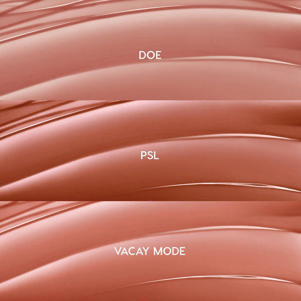 Glossy swatches showcase Lush Pout, ColourPop So Juicy Plumping Gloss Balm with Peptides: three nude-pink shades - Doe (rosy beige), PSL (warm caramel), and Vacay Mode (peachy nude) - layered in curved stripes on a clean backdrop.