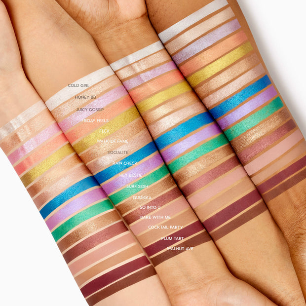 Honey BB ColourPop Shadow Stix swatch shines as a warm honey‑gold shimmer, drawn in a single stripe on four forearms from light to deep skin tones, shown among labeled Shadow Stix shade swatches for easy color comparison.