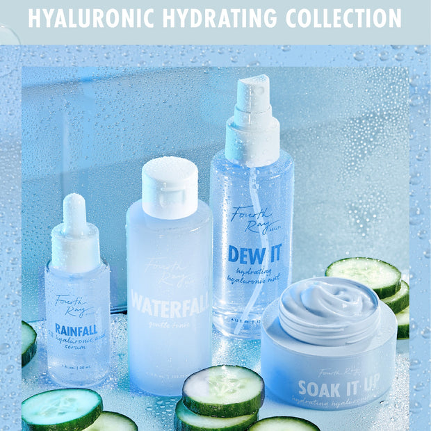 Fourth Ray Beauty Rainfall 2% HA Serum dropper bottle beaded with condensation, set beside Waterfall gentle tonic, Dew It hydrating mist, and Soak It Up cream with cucumber slices on a misty blue backdrop - hydrating ColourPop Face Serum.