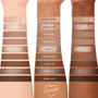 Brewtiful Neutrals Shadow Palette Set by ColourPop swatched on three forearms - light, medium, and deep skin tones - showing 10 coffee-inspired neutral shades from Salted Caramel to Double Shot in matte, shimmer, and metallic finishes.