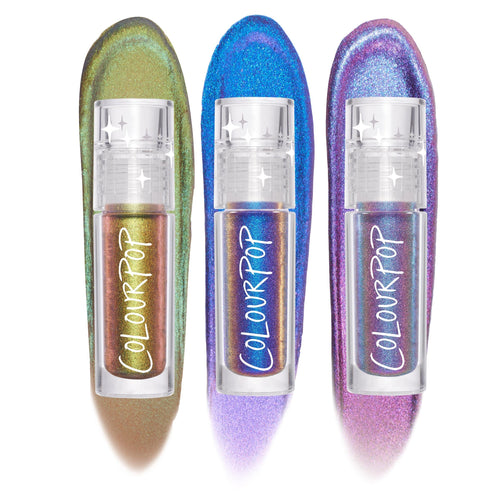 Feelin’ Bold ColourPop Chrome Liquid Shadow bundle shows three tubes standing upright, each with a bold multichrome swatch behind - green‑gold bronze, electric blue‑teal, and violet‑pink shifts - on a white studio background.