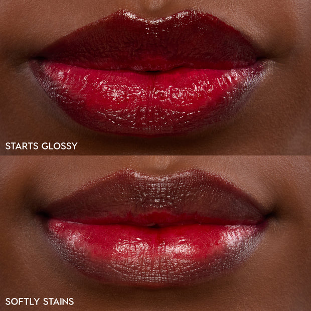 Fruit Punch ColourPop Lip Stain coating lips in a split macro swatch - top labeled Glossy shows a full-coverage, high-shine red, while bottom labeled Stain shows a sheer cherry tint after wear, highlighting shade payoff and finish comparison.