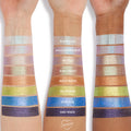 ColourPop Boo-Kay Jelly Much Shadow eyeshadow swatches shown on three skin tones, displaying shimmering shades Super Cool, Hallucinogenius, Big Ego, Shiny Penny, Brentwood, Billionaire, Stargaze, and Emo Inside in neat horizontal stripes.