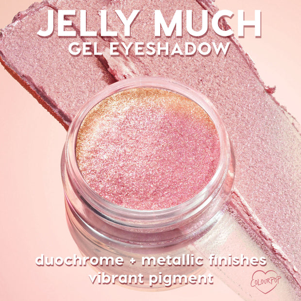 ColourPop Jelly Much Shadow Hallucinogenius swirled in a clear jar, catching light to reveal a pink-to-gold duochrome metallic sheen, with vibrant pigment swatches on a soft pink backdrop, showcasing its jelly gel eyeshadow texture.
