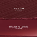 Swatch duo showcases Slow Burn: ColourPop Lux Lipstick shade Enemies to Lovers, a smooth deep burgundy smear on the bottom, paired with Seduction Lippie Pencil’s textured wine‑red stroke above, on a clean studio background.