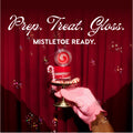ColourPop Candy Cane Lip Mask jar with red‑white swirled balm opened, held on a small pedestal by a pink‑gloved hand beside a candy cane and peppermint, bubbles drifting before deep red curtains with the holiday headline Prep. Treat. Gloss. Mistletoe Ready.