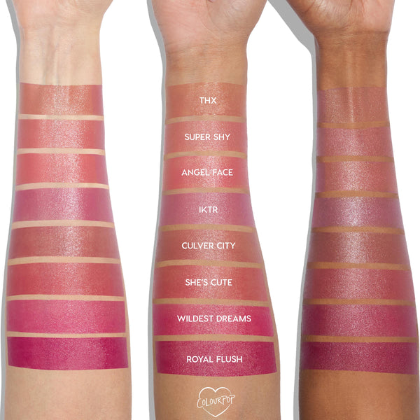IKTR shade of ColourPop Liquid Blush swatched in stripes on three arms with light, medium, and deep skin tones; shade names are labeled, with IKTR fourth from the top on the center arm, showing a rosy‑mauve hue with a dewy finish for comparison.