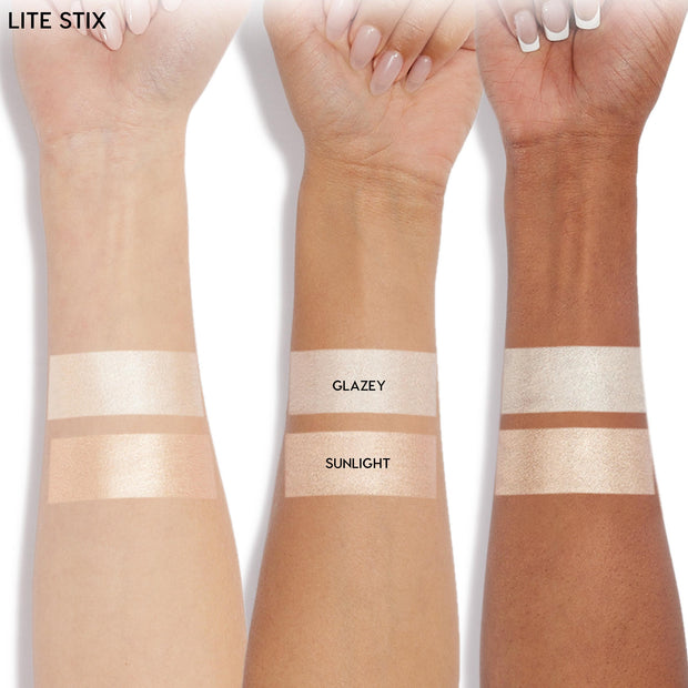 Glazey Lite Stix swatches glow across three forearms, with two stripes per arm - Glazey on top, Sunlight below - showing the ColourPop Lite Stix pearly highlight on light, medium, and deep skin tones against a white background.