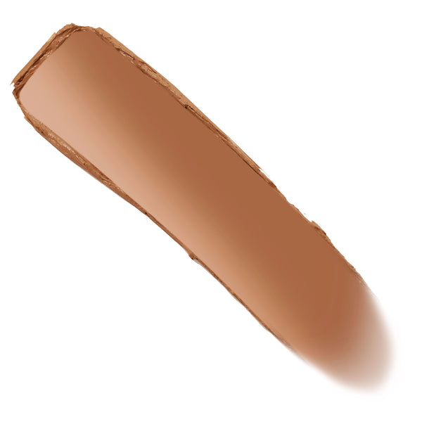 ColourPop Bronzer Stix shade Moonstone Beach swatched in a single diagonal swipe, warm medium tan bronze with a creamy matte finish and soft-blended edge on a white background.