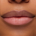 Hydrated lips wearing Thunderbolt, a ColourPop pH Lip Balm, showing a rosy pink, color‑adapting tint with a dewy sheen in a tight studio close‑up, highlighting smooth texture and a natural finish.