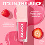 ColourPop So Juicy Plumping Glossy Lip Oil in Baby Panda stands upright with vivid pink gloss, flanked by raspberries, a strawberry slice, and shiny oil swirls, highlighting ceramides, peptides, and raspberry + strawberry oils for plump, smooth lips.