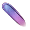 Same Vibe ColourPop Chrome Liquid Shadow swatch shifts from electric blue to violet-pink, glimmering with fine shimmer in a smooth, elongated swipe on a white background, showcasing its bold duochrome payoff.