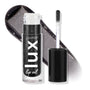 Team Jacob ColourPop Lux Lip Oil displayed open, doe-foot applicator beside the tube and a glossy charcoal-black swatch with silver shimmer behind, highlighting the sheer, high-shine finish; cap off on a white studio backdrop.