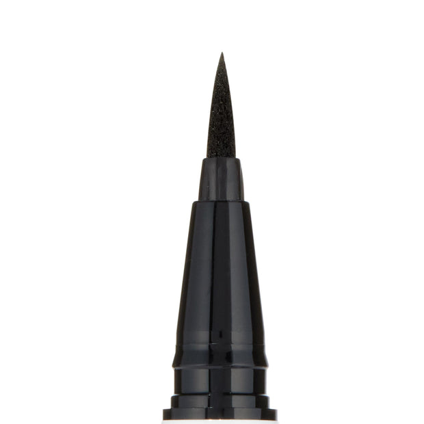 Felt-tip applicator delivering precise black lines, shown as a close-up of the ColourPop BFF Liquid Liner in Numero Uno, with the sharp black tip and glossy black pen housing centered against a clean white background.