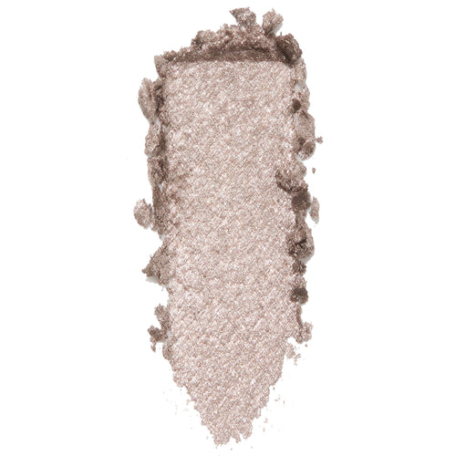 ColourPop I Heart This Super Shock Shadow swatch, a metallic champagne‑taupe with silver glitter, shown as a thick vertical smear with textured, crumbled edges on a white background to highlight its high-shine finish.