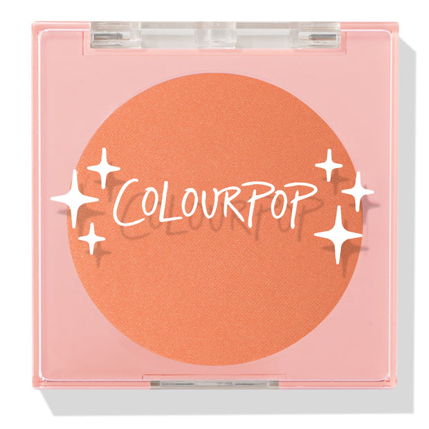 ColourPop Pressed Powder Blush Pretty Toasty compact displaying a warm toasted peach pan, closed under a clear lid with white sparkles logo, set in a pale pink square case for travel-friendly, everyday makeup.